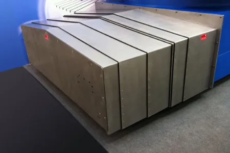 Arquitectura de un protector telescópico sobre guías de máquinas